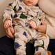 Liewood Salopetă pijama Birk Grow Dino roar / Sandy